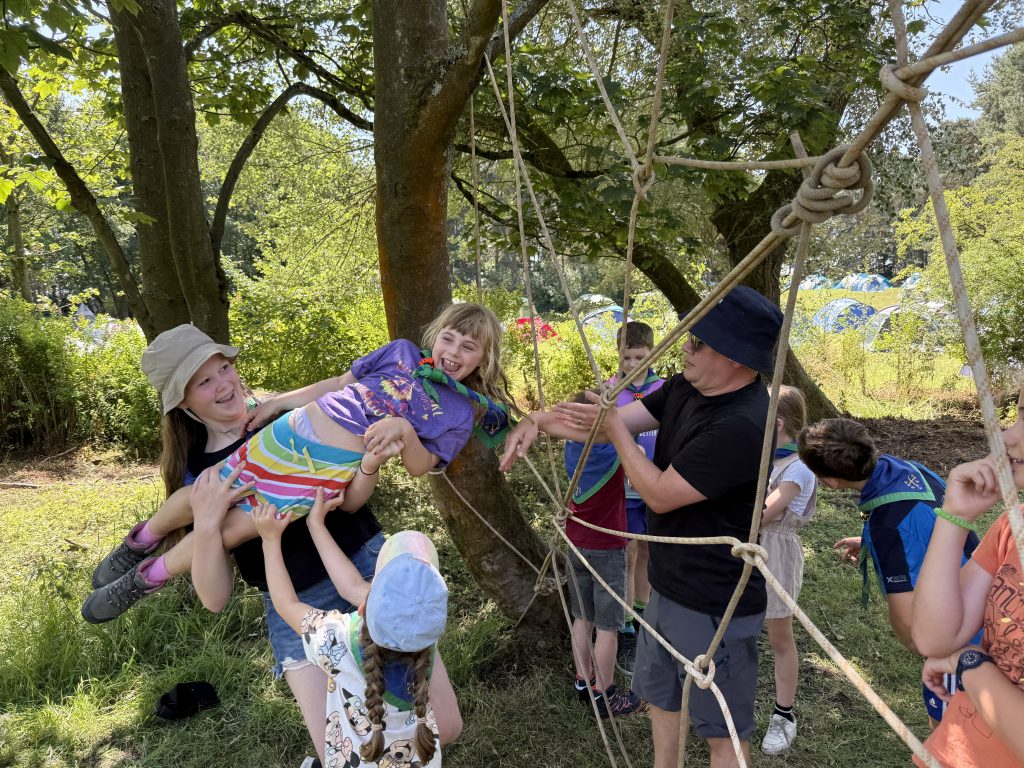 Passing people through teh spiders web- great teamwork! #DringyGroupCamp25