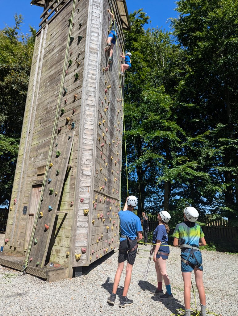 Going up the climbing tower. #DringyGroupCamp25